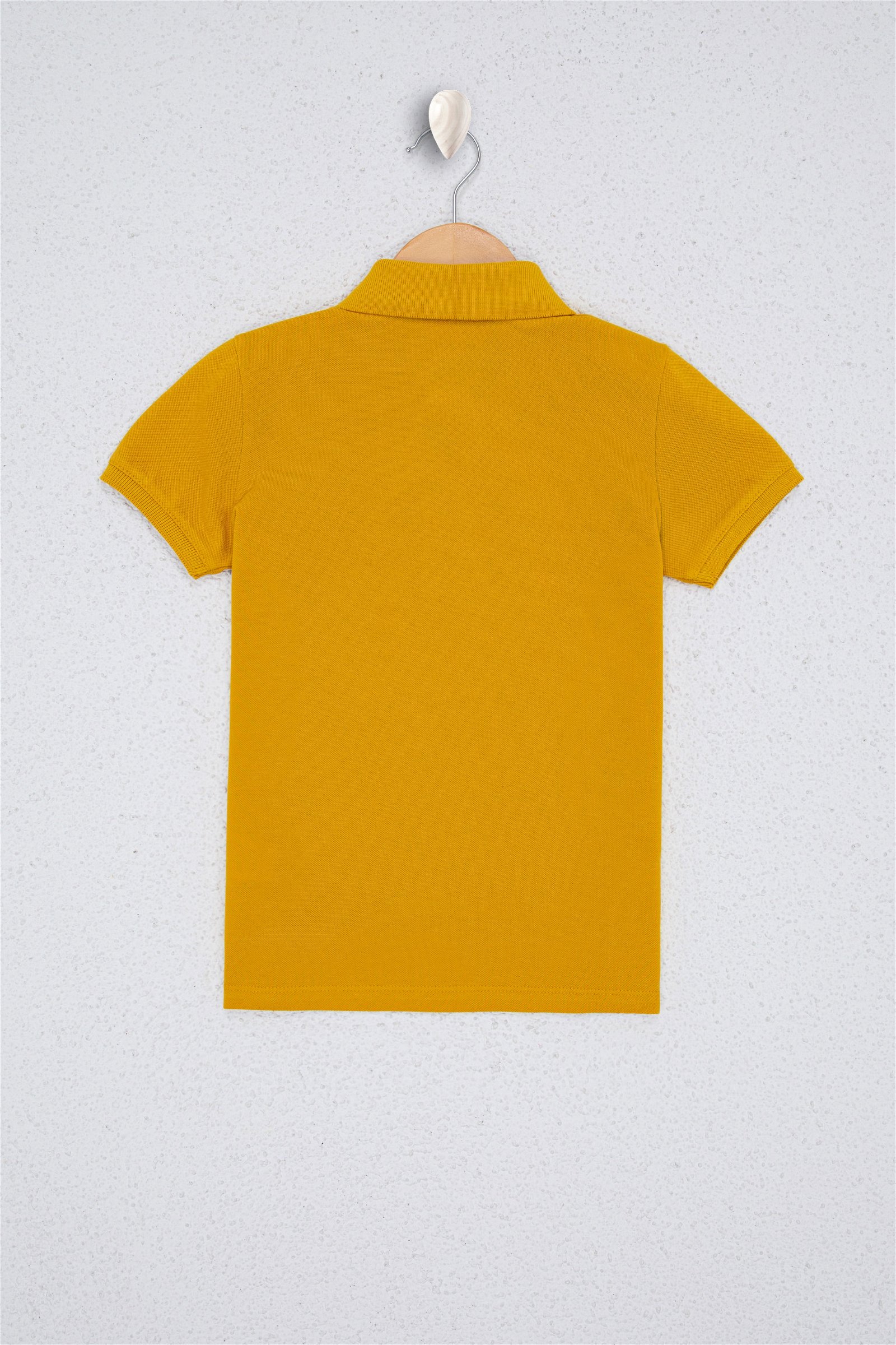 تی شرت یقه پولو زرد تیره  استاندارد فیت آستین کوتاه پسرانه یو اس پولو | US POLO ASSN